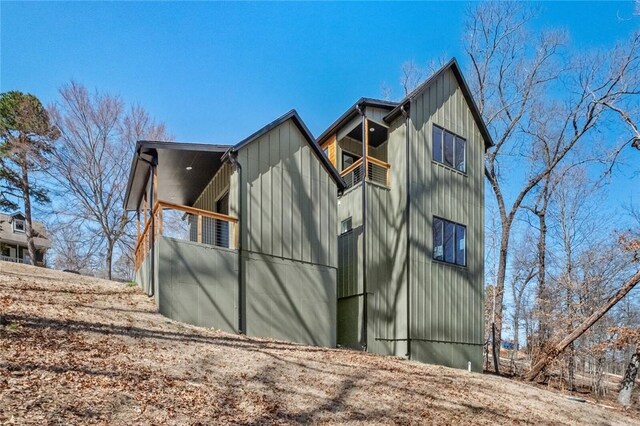 10 Reading Ln, Bella Vista, AR 72714 - view of property exterior with a balcony