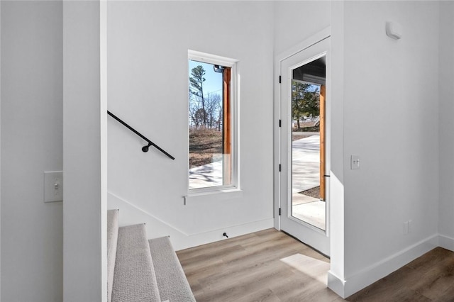 10 Reading Ln, Bella Vista, AR 72714 - entryway with baseboards and wood finished floors