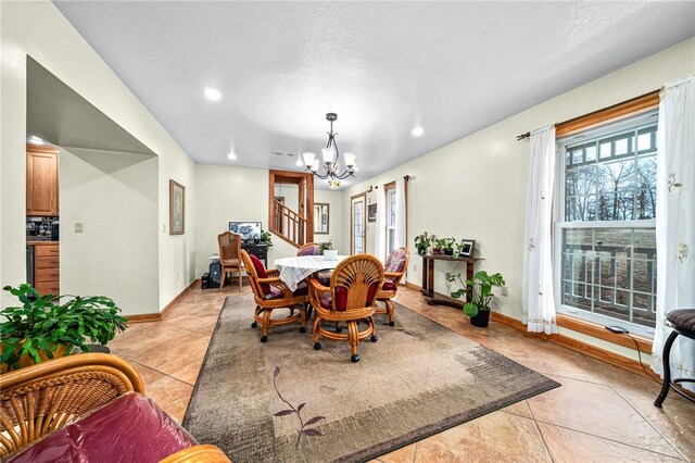 2428 Winn Mountain Loop, Mountainburg, AR 72946 - dining room featuring stairway, light tile patterned floors, baseboards, a notable chandelier, and recessed lighting