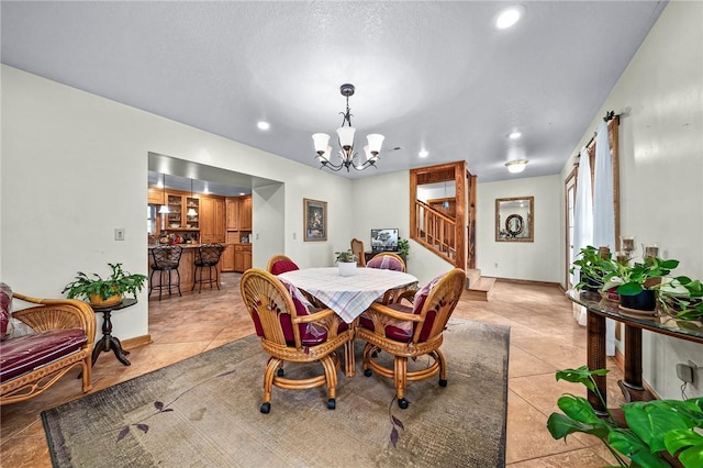 2428 Winn Mountain Loop, Mountainburg, AR 72946 - dining room with stairs, recessed lighting, a notable chandelier, and light tile patterned flooring