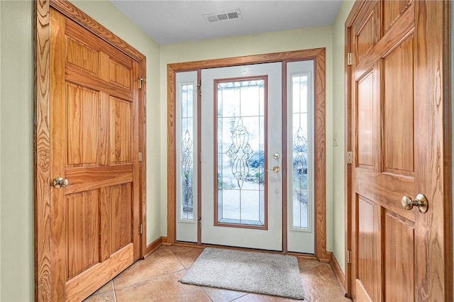2428 Winn Mountain Loop, Mountainburg, AR 72946 - entryway with visible vents, baseboards, and light tile patterned floors