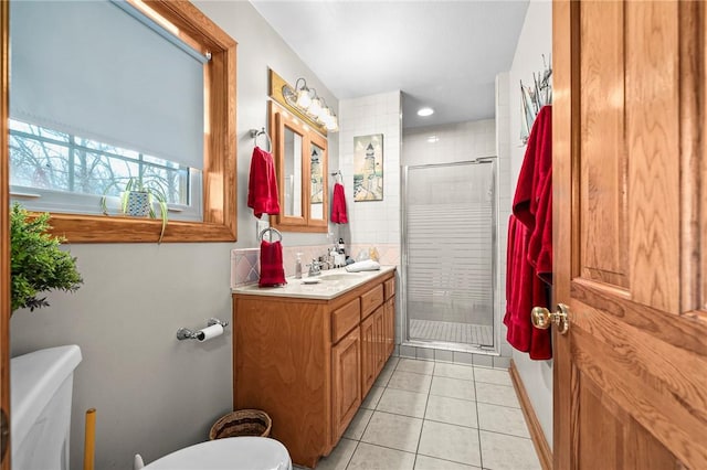 2428 Winn Mountain Loop, Mountainburg, AR 72946 - full bath featuring tile patterned floors, toilet, baseboards, a shower stall, and vanity