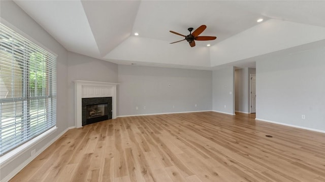 108 Birch St, Centerton, AR 72719 - unfurnished living room with lofted ceiling, recessed lighting, ceiling fan, a tile fireplace, and light wood finished floors