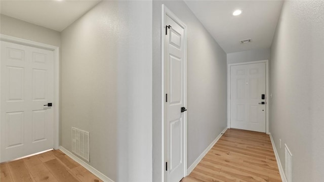 108 Birch St, Centerton, AR 72719 - corridor featuring light wood-style flooring, baseboards, and recessed lighting