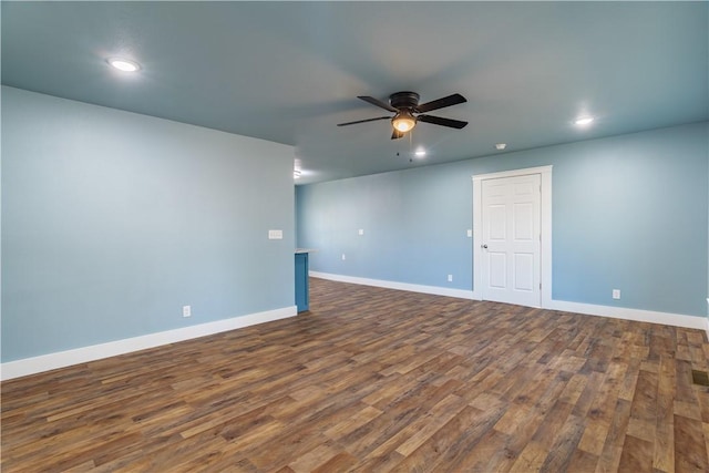unfurnished room featuring ceiling fan, dark wood-style floors, baseboards, and recessed lighting
