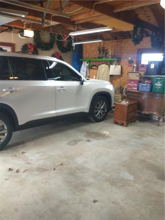 82 County Road 327, Berryville, AR 72616 - garage featuring a garage door opener