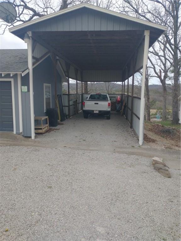 82 County Road 327, Berryville, AR 72616 - view of vehicle parking with a detached carport and driveway