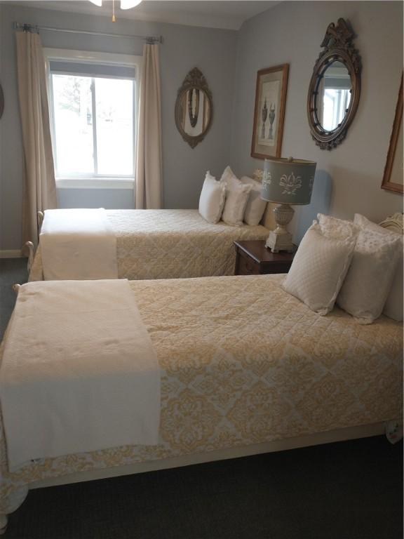 82 County Road 327, Berryville, AR 72616 - carpeted bedroom featuring baseboards