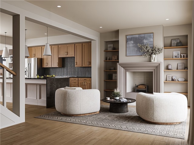 423 SE B St, Bentonville, AR 72712 - living area featuring recessed lighting, wood finished floors, and a fireplace