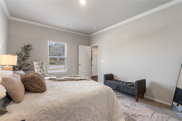bedroom with baseboards, ornamental molding, visible vents, and carpet