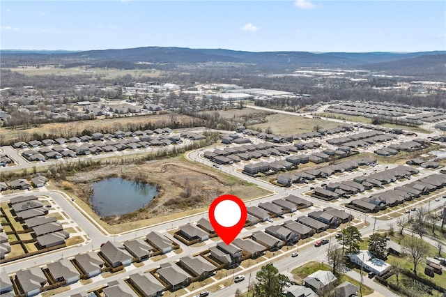 drone / aerial view with a mountain view and a residential view
