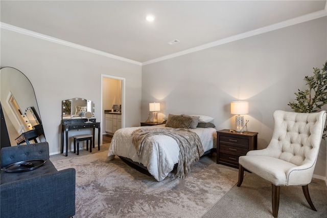 bedroom with crown molding, ensuite bath, light colored carpet, baseboards, and visible vents