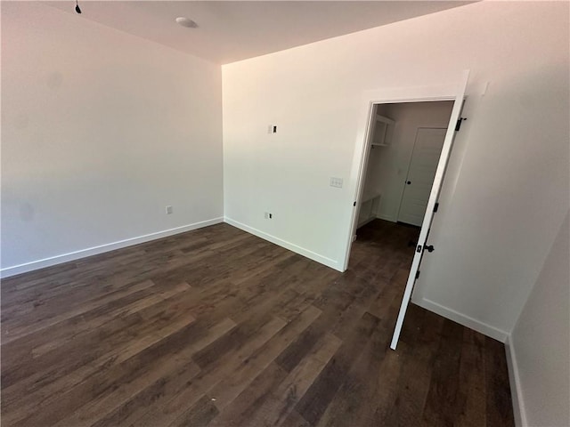 11 Romine Ln, Bella Vista, AR 72715 - spare room featuring dark wood-style floors