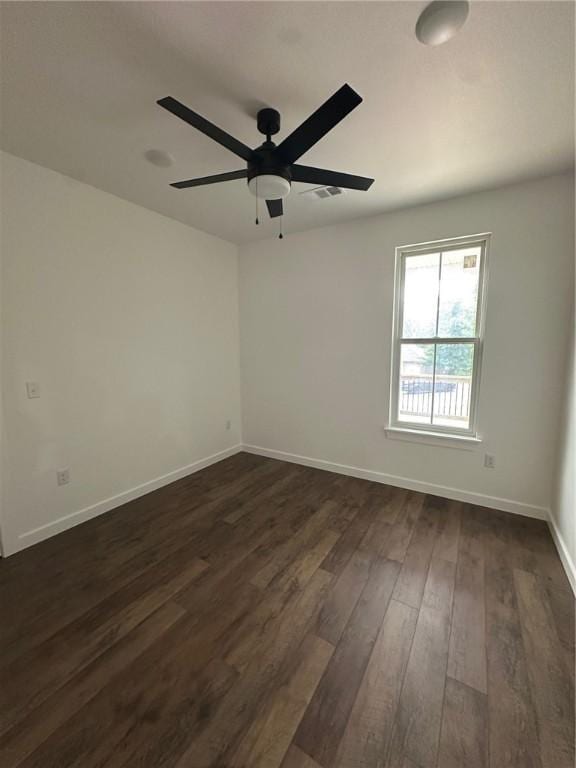 11 Romine Ln, Bella Vista, AR 72715 - unfurnished room with dark wood-style flooring and ceiling fan