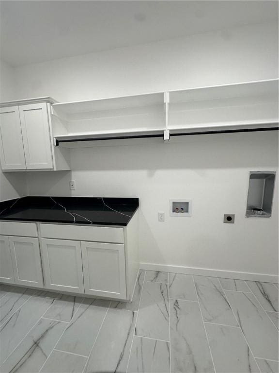11 Romine Ln, Bella Vista, AR 72715 - washroom with electric dryer hookup, washer hookup, light marble finish flooring, and cabinet space