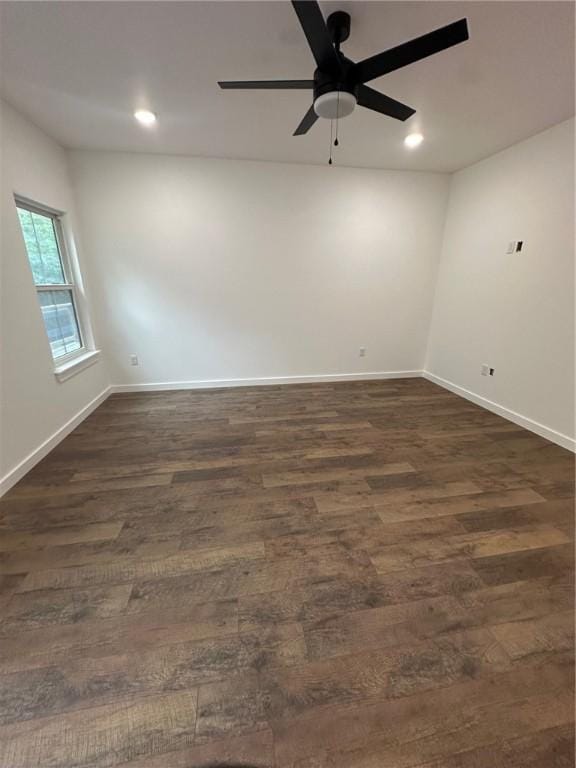 11 Romine Ln, Bella Vista, AR 72715 - unfurnished room with dark wood-style flooring, a ceiling fan, and recessed lighting