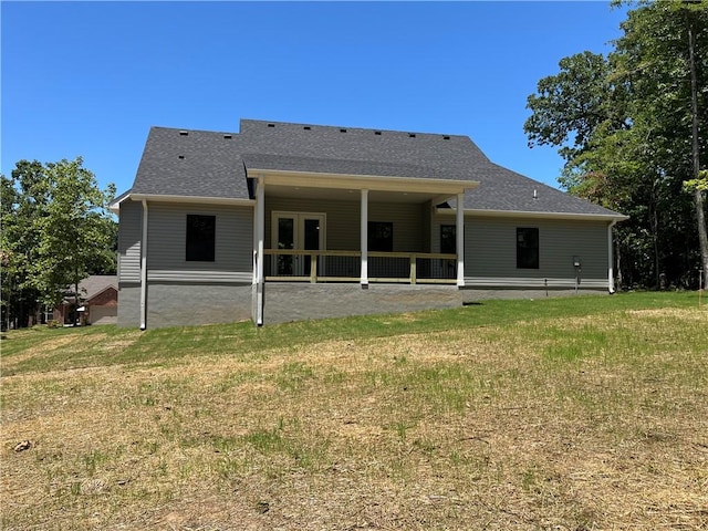 11 Romine Ln, Bella Vista, AR 72715 - rear view of house with a yard and roof with shingles