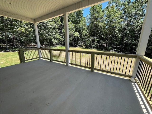 11 Romine Ln, Bella Vista, AR 72715 - view of patio / terrace featuring view of wooded area