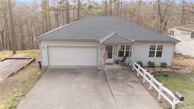 16101 Hickory Dr, Rogers, AR 72756 - single story home with an attached garage, driveway, and roof with shingles