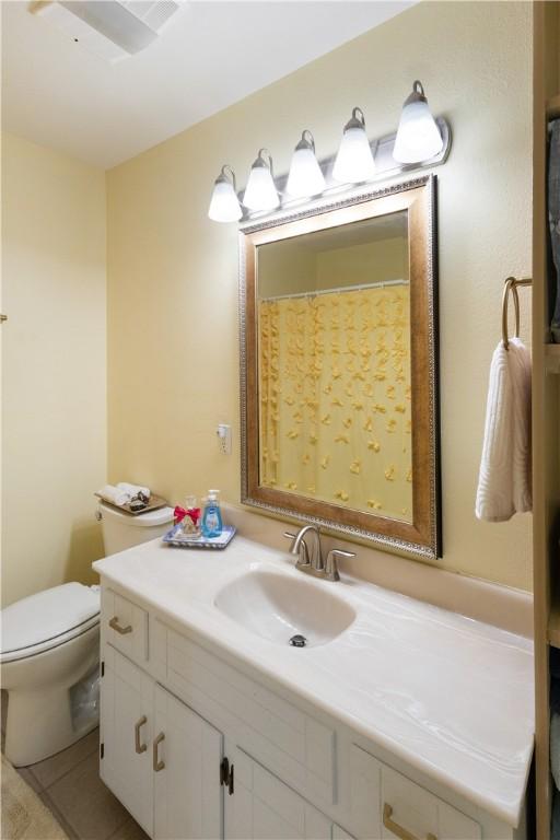 16101 Hickory Dr, Rogers, AR 72756 - bathroom featuring toilet and vanity