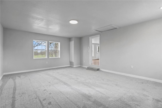 291 E Pilcher Rd, Kansas, OK 74347 - carpeted empty room featuring baseboards and attic access
