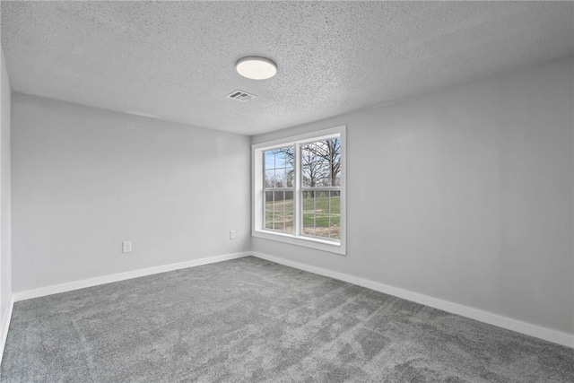 291 E Pilcher Rd, Kansas, OK 74347 - carpeted empty room with a textured ceiling and baseboards
