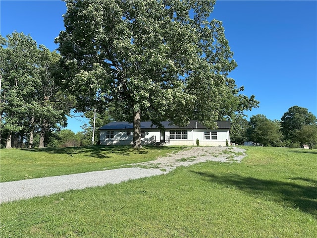 291 E Pilcher Rd, Kansas, OK 74347 - view of grassy yard featuring gravel driveway