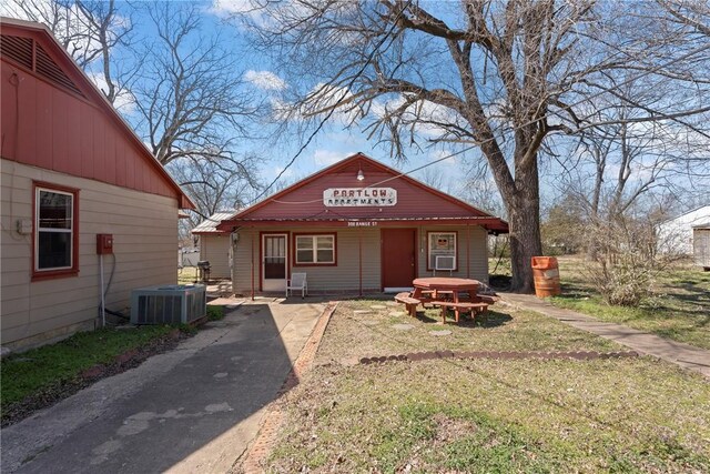 300 Range St, Marshall, AR 72650 - bungalow-style home with cooling unit and central AC unit