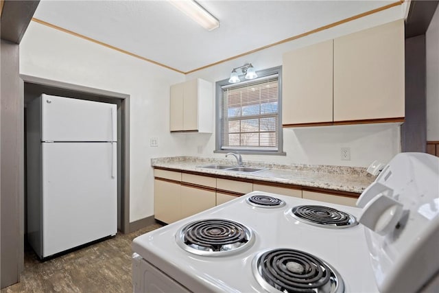300 Range St, Marshall, AR 72650 - kitchen featuring light countertops, a sink, dark wood-style flooring, and white appliances