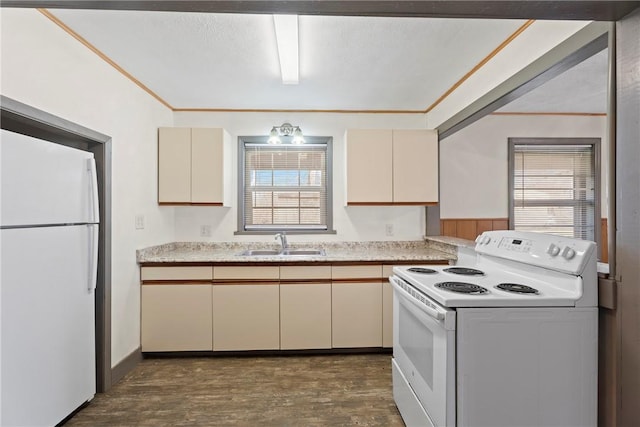 300 Range St, Marshall, AR 72650 - kitchen with light countertops, cream cabinetry, a sink, and white appliances