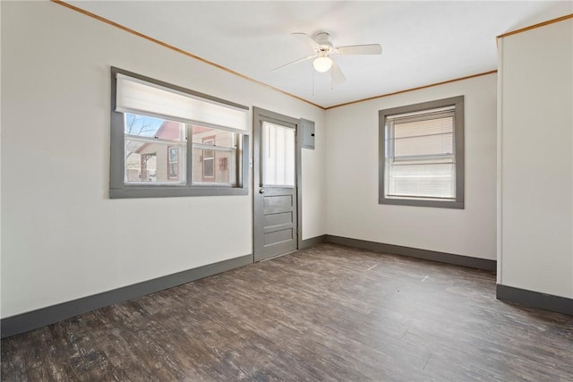 300 Range St, Marshall, AR 72650 - empty room with ornamental molding, wood finished floors, and a healthy amount of sunlight