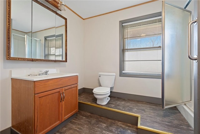 300 Range St, Marshall, AR 72650 - bathroom with vanity, crown molding, toilet, baseboards, and a stall shower