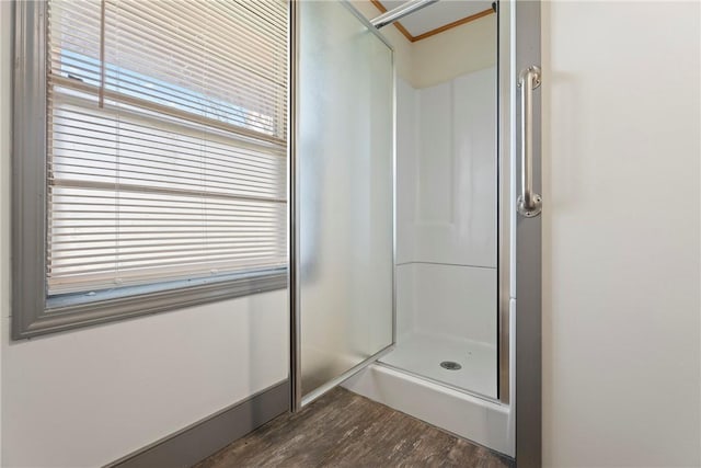 300 Range St, Marshall, AR 72650 - full bathroom featuring a stall shower and wood finished floors