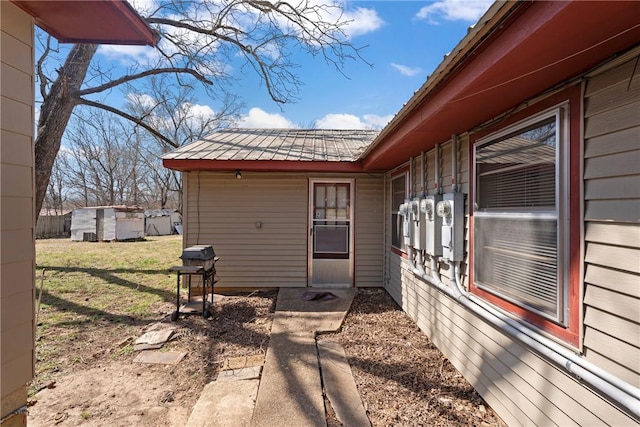 300 Range St, Marshall, AR 72650 - exterior space with a lawn, an outbuilding, and a storage shed