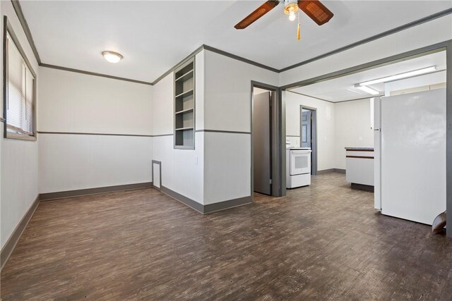 300 Range St, Marshall, AR 72650 - interior space featuring dark wood-type flooring, ceiling fan, baseboards, and crown molding