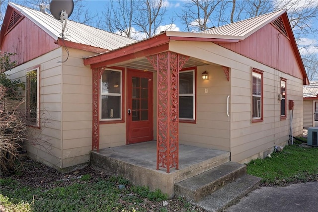 300 Range St, Marshall, AR 72650 - exterior space with metal roof, central AC, and covered porch