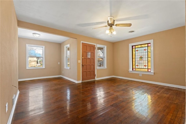 300 Range St, Marshall, AR 72650 - entryway featuring baseboards, ceiling fan, visible vents, and dark wood finished floors