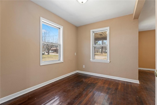 300 Range St, Marshall, AR 72650 - spare room with dark wood finished floors and baseboards