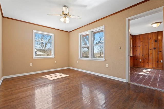 300 Range St, Marshall, AR 72650 - unfurnished room featuring hardwood / wood-style flooring, baseboards, ornamental molding, ceiling fan, and a textured wall