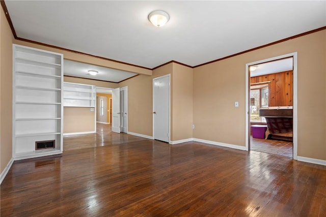 300 Range St, Marshall, AR 72650 - unfurnished living room featuring ornamental molding, hardwood / wood-style flooring, baseboards, and visible vents