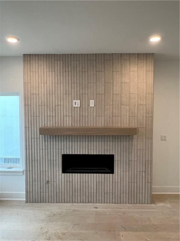 111 S Paddock Loop, Fayetteville, AR 72701 - detailed view of baseboards, a fireplace, and recessed lighting