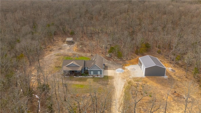 bird's eye view featuring a forest view