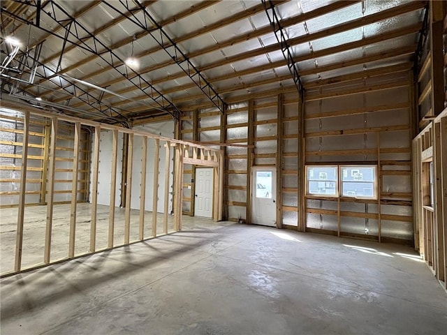 miscellaneous room with unfinished concrete flooring