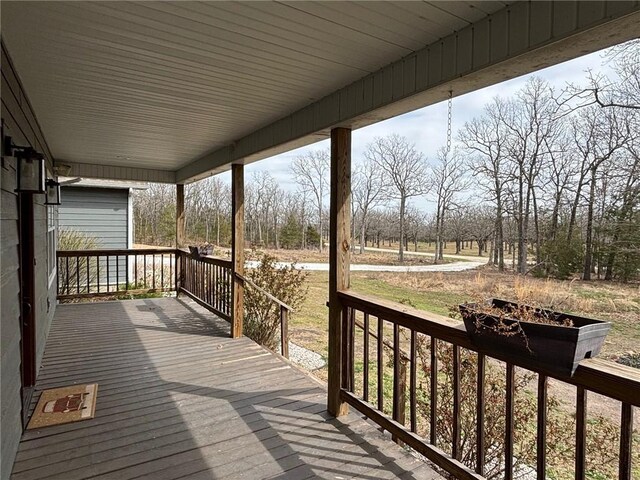 deck with covered porch