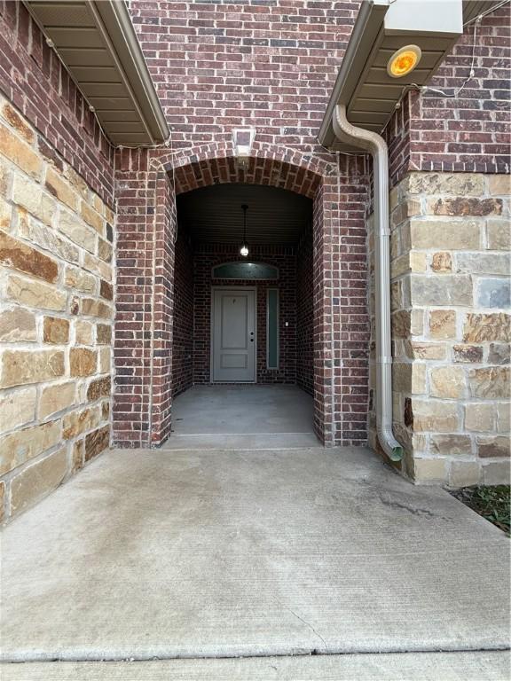 2401 Armstrong Ln, Pea Ridge, AR 72751 - entrance to property featuring a carport and brick siding