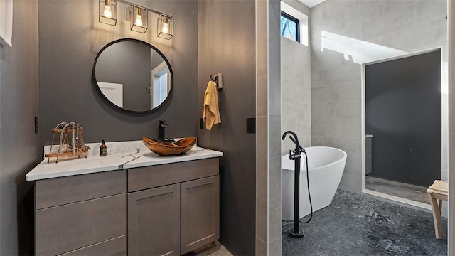 122 SW Gailey Hollow Rd, Siloam Springs, AR 72761 - bathroom featuring a soaking tub and vanity