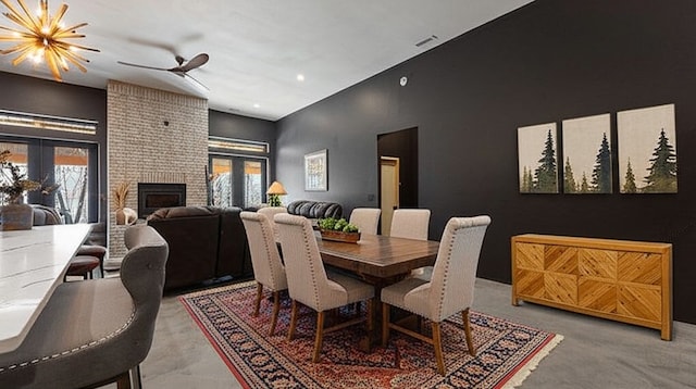 122 SW Gailey Hollow Rd, Siloam Springs, AR 72761 - dining area featuring healthy amount of natural light, a fireplace, a ceiling fan, carpet floors, and recessed lighting