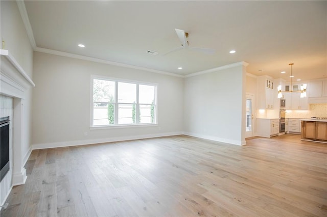 5914 SW Bloomsbury Rd, Bentonville, AR 72713 - unfurnished living room featuring crown molding, a fireplace, light wood-style floors, recessed lighting, and ceiling fan