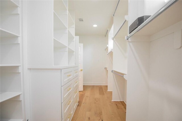 5914 SW Bloomsbury Rd, Bentonville, AR 72713 - walk in closet featuring light wood-style floors