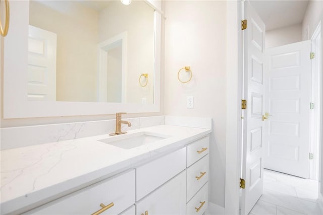 5914 SW Bloomsbury Rd, Bentonville, AR 72713 - bathroom featuring marble finish flooring and vanity
